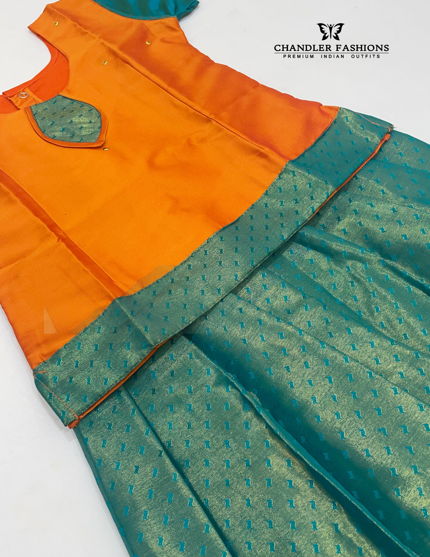 Orange And Green Colored Silk Langa Sets