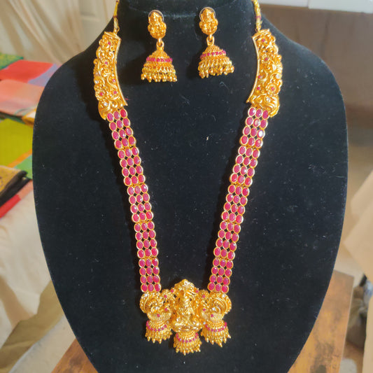 Dazzling Antique Gold Plated Long Lakshmi Ruby Haaram Set With Jumkhas Earrings 