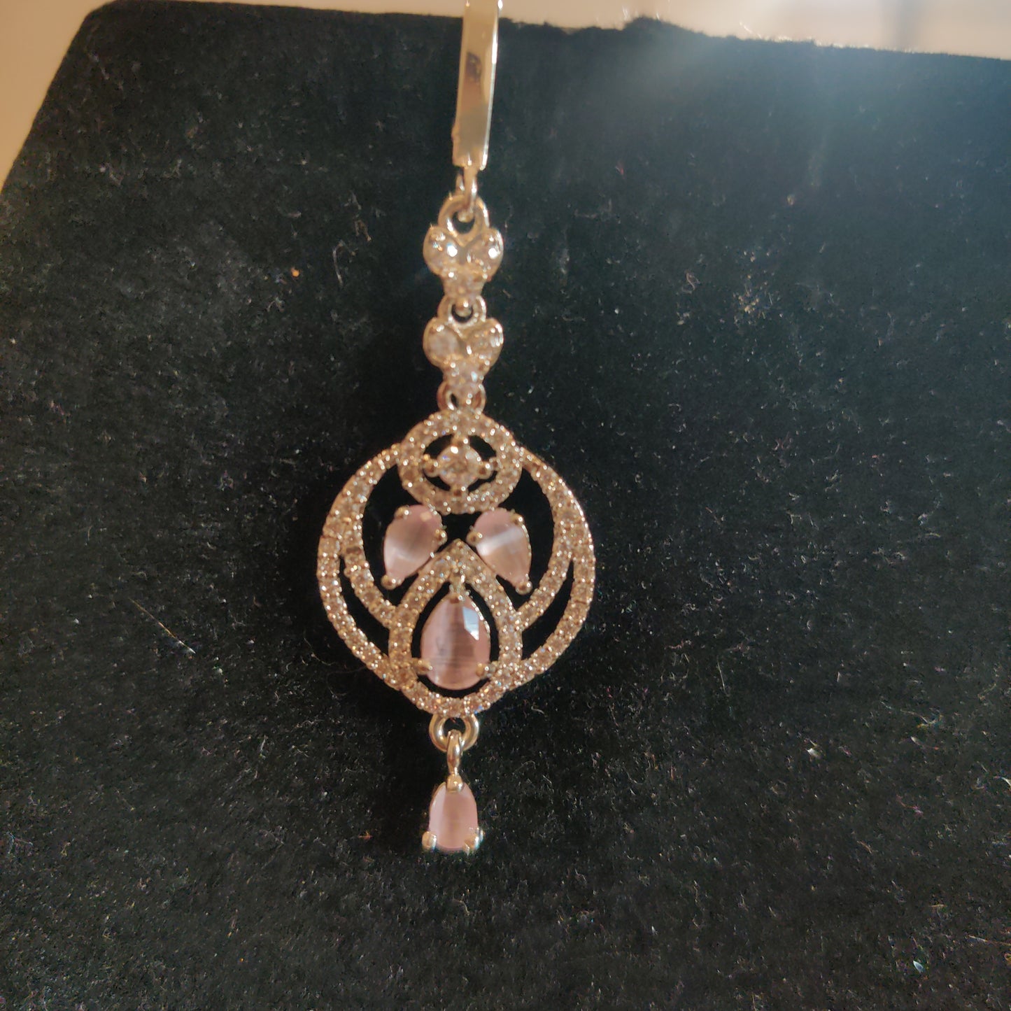 Appealing AD Maang Tikka With Light Pink And Green Colored Stones