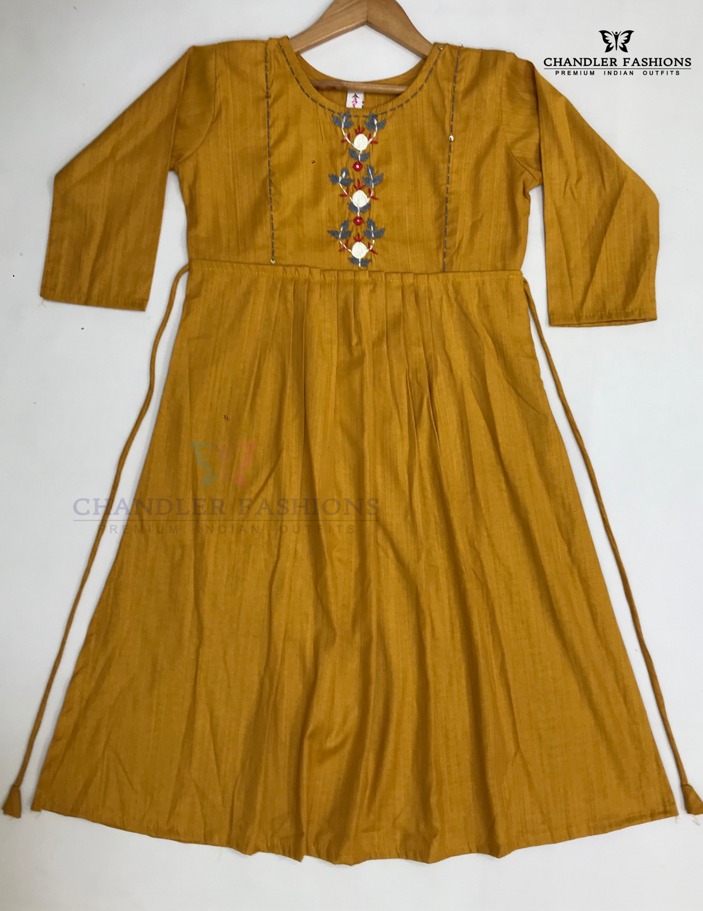 Mustard Yellow Color Rayon With Embroidery And Mirror Work Kurti In Chander