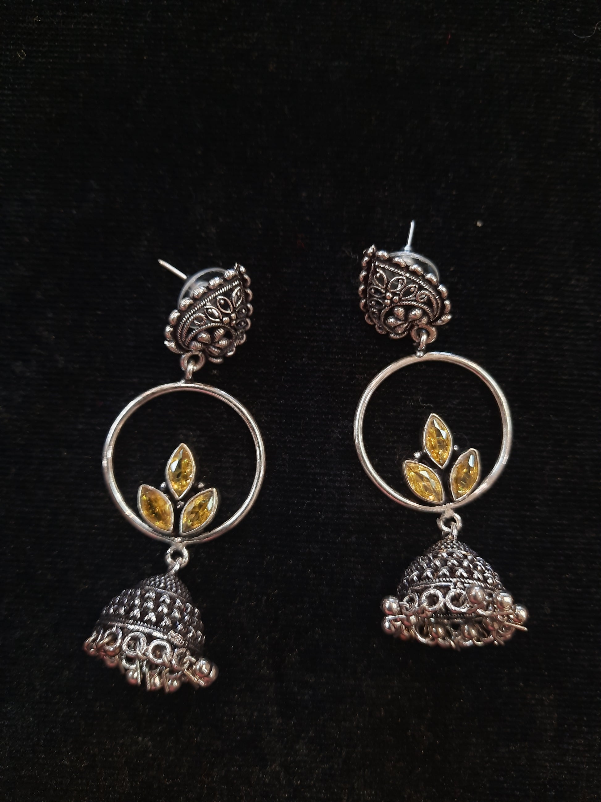 Alluring Mustard Yellow Color Floral Design Silver Oxidized Jhumka For Women