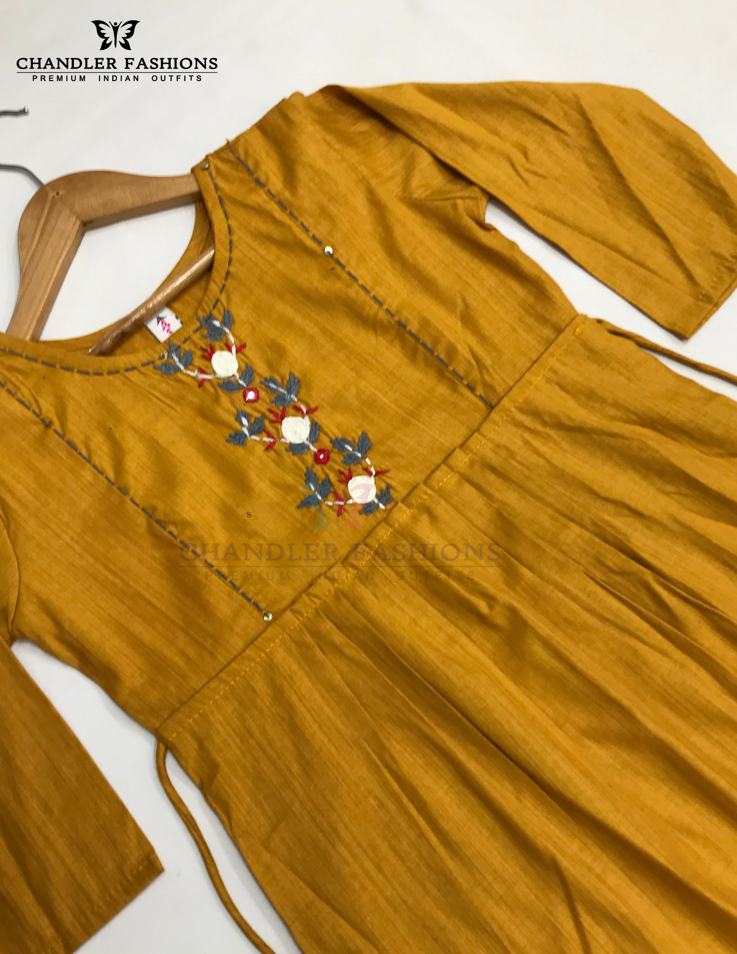Mustard Yellow Color Rayon With Embroidery And Mirror Work Kurti In Yuma