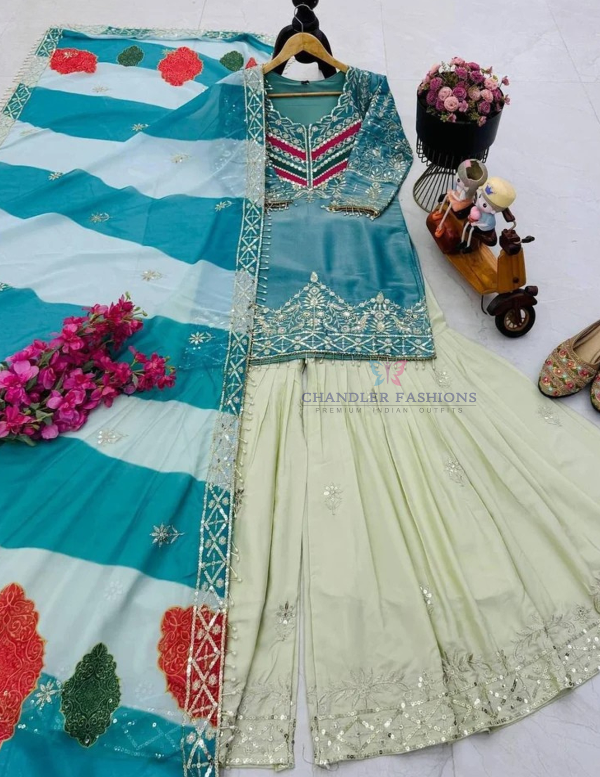 Teal Blue Color With Embroidery And Sequins Work Sharara Suit In Yuma
