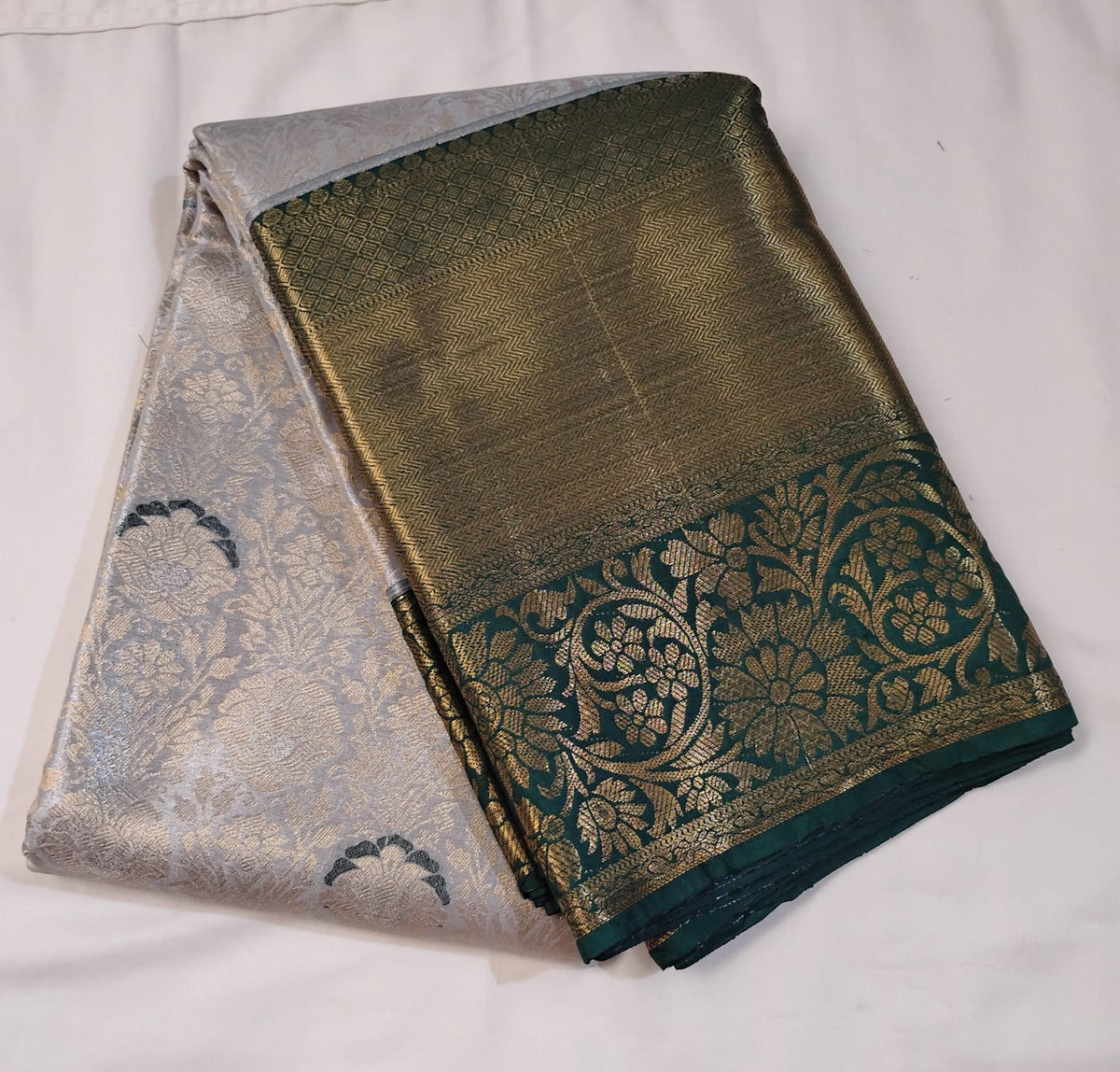 Wonderful Gray Color Pure Kanchi Silk With Green Border Gold Zari Work Saree For Women