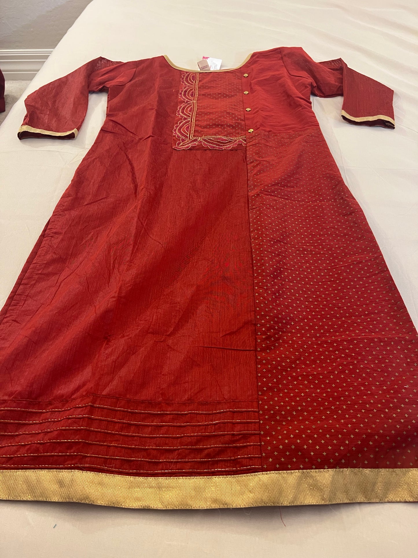 Red Kurti With Round Neck and Gold Designs