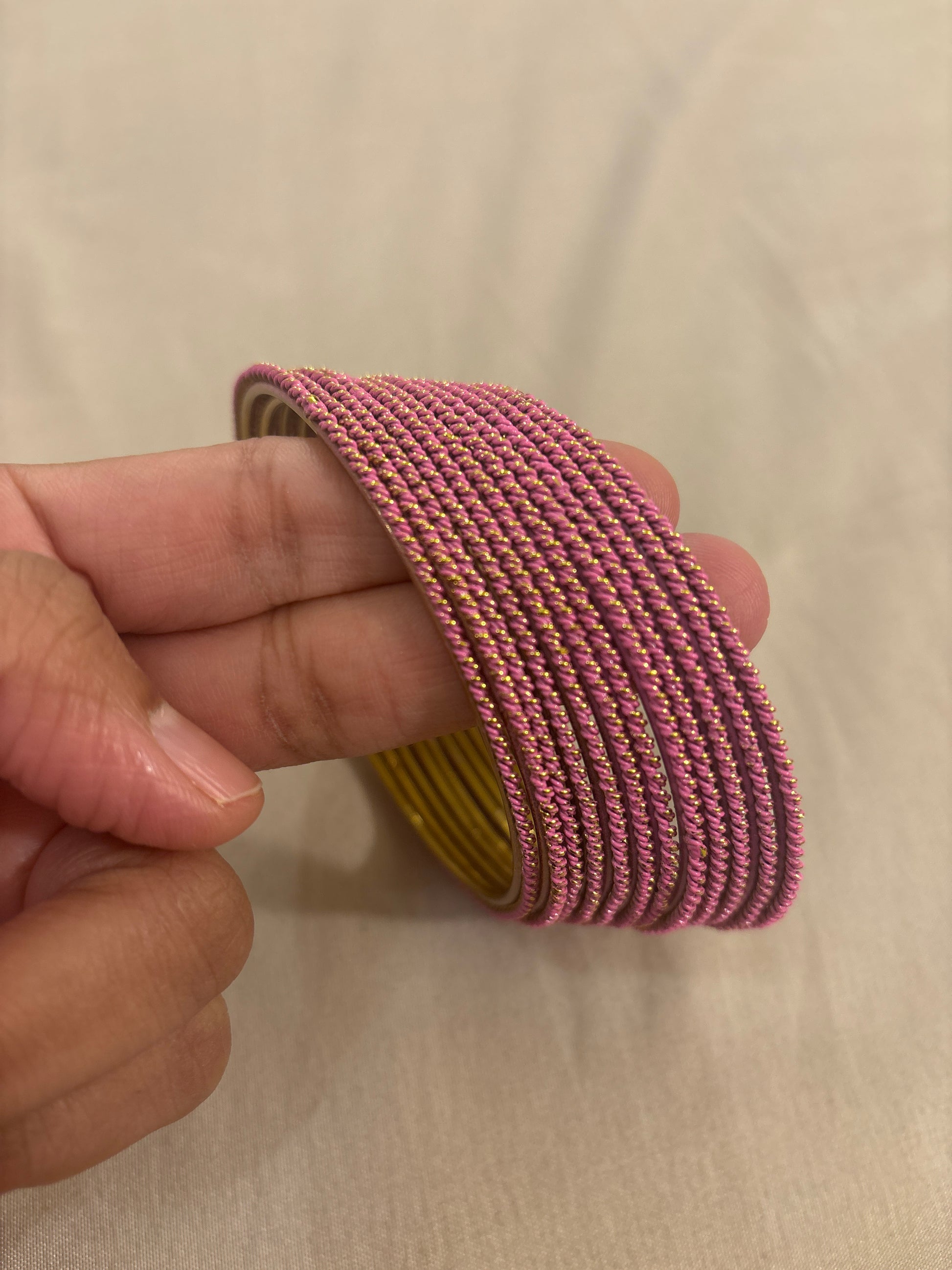 Elegant Light Pink Color Plain Lehar Dot Printed Antique Gold Bangle With Glitters