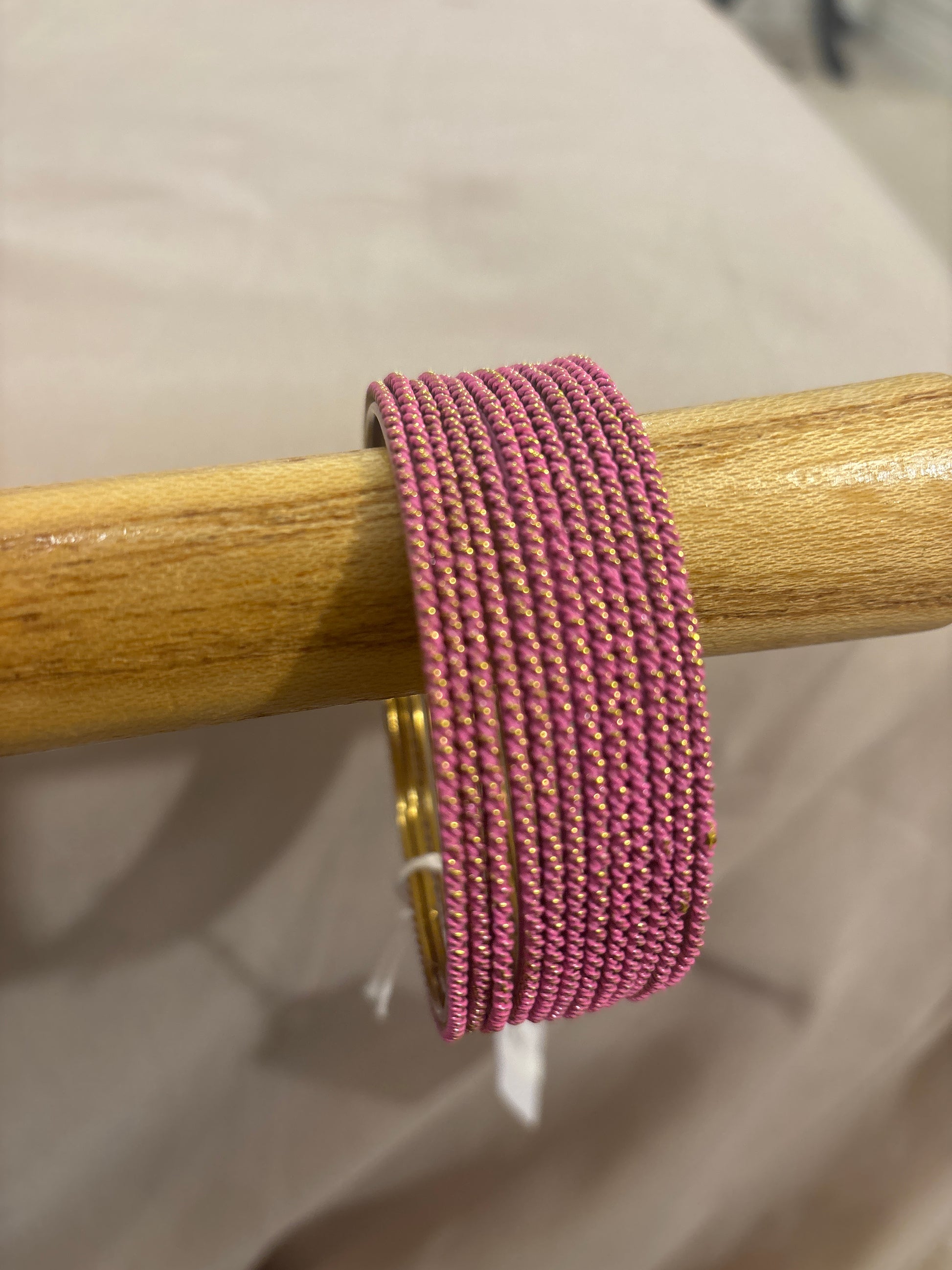 Elegant Light Pink Color Plain Lehar Dot Printed Antique Gold Bangle With Glitters Near Me