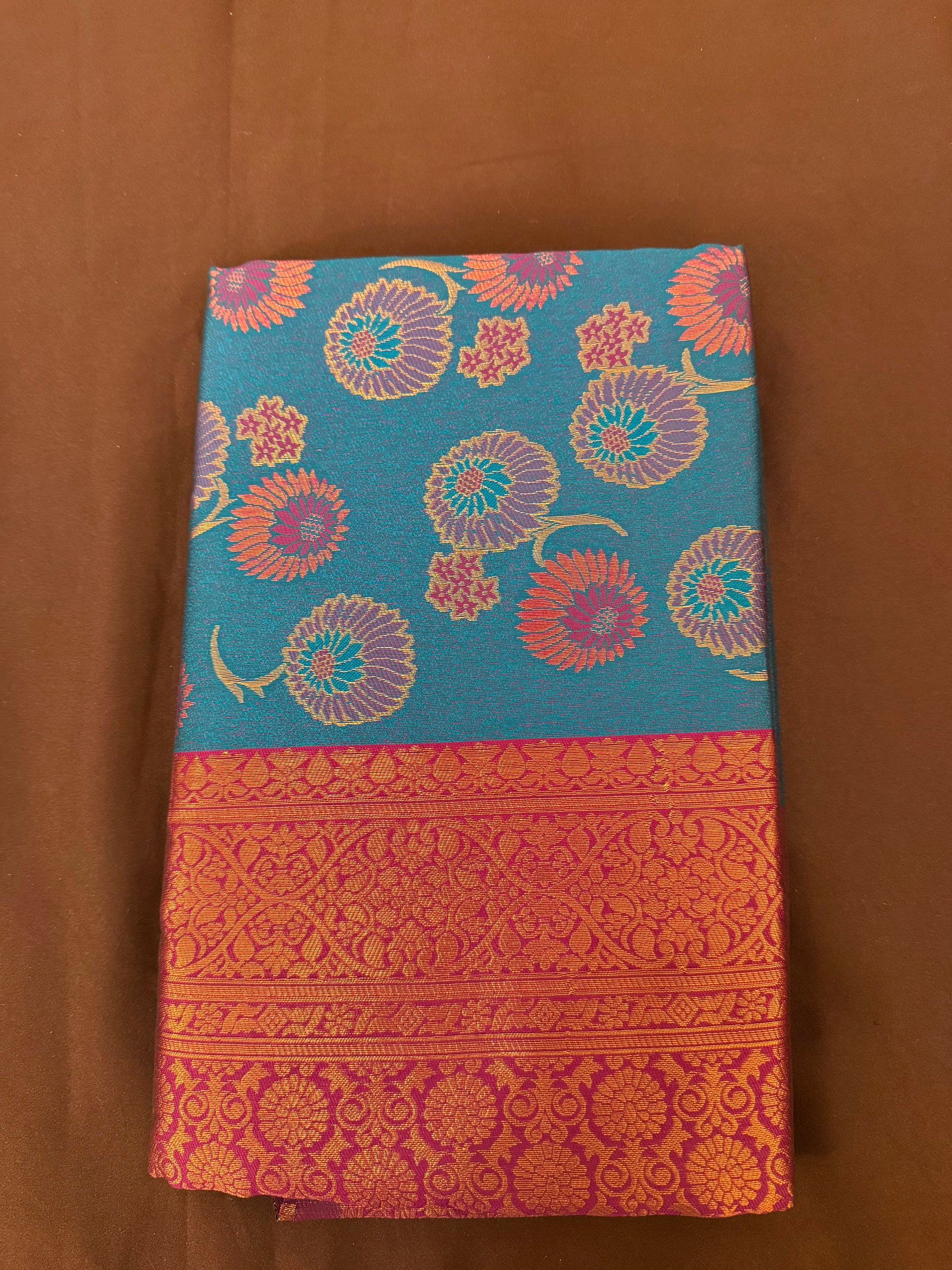 Attractive Teal Blue Color Kora Muslin Saree With Contrast Border For Women