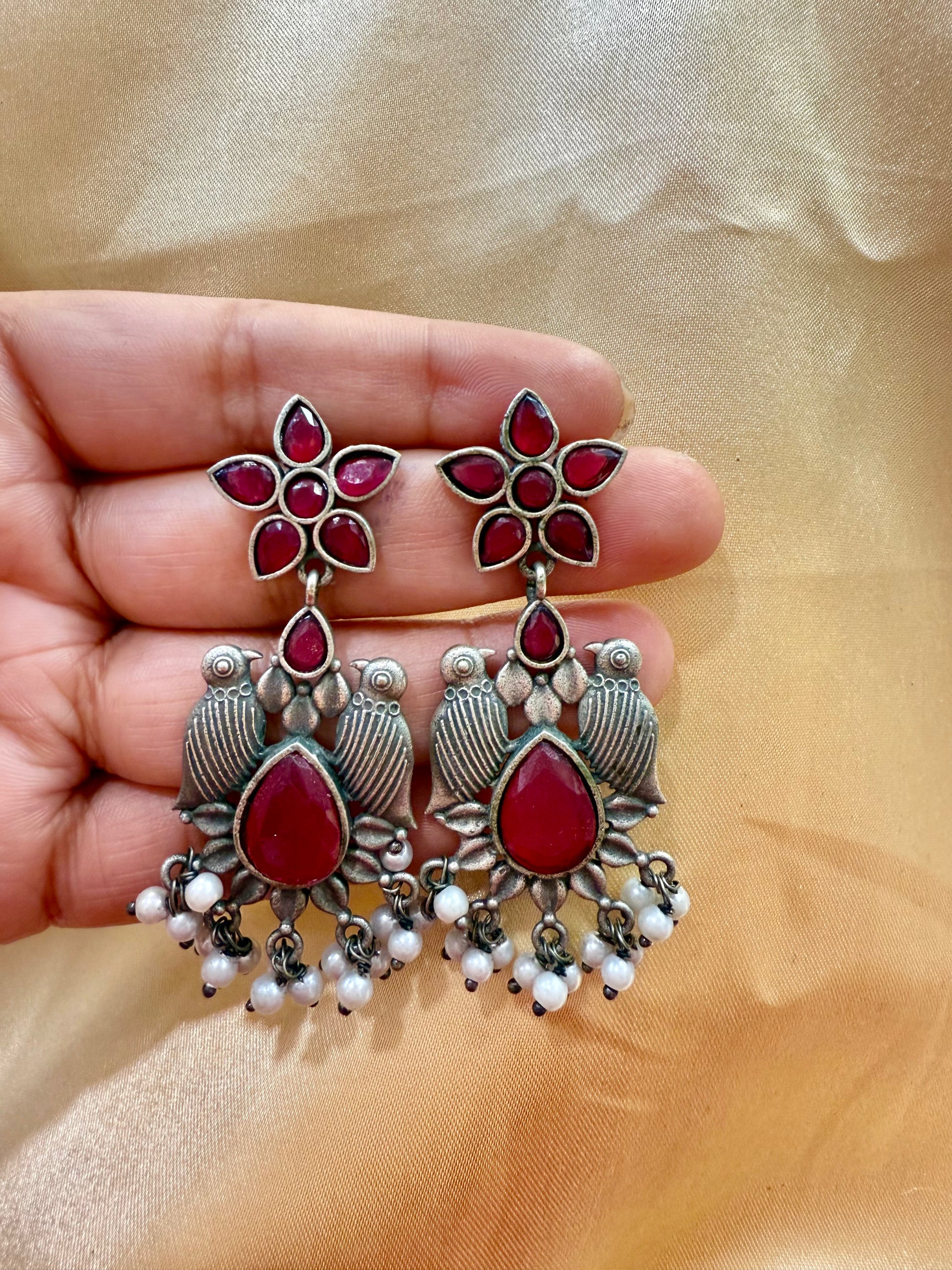 Appealing Oxidized Red Stone And Beaded Work Bird Designs Earrings Near Me
