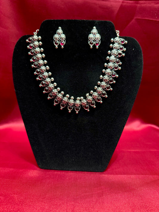 Appealing Oxidized German Silver Magenta Color Necklace With Earrings