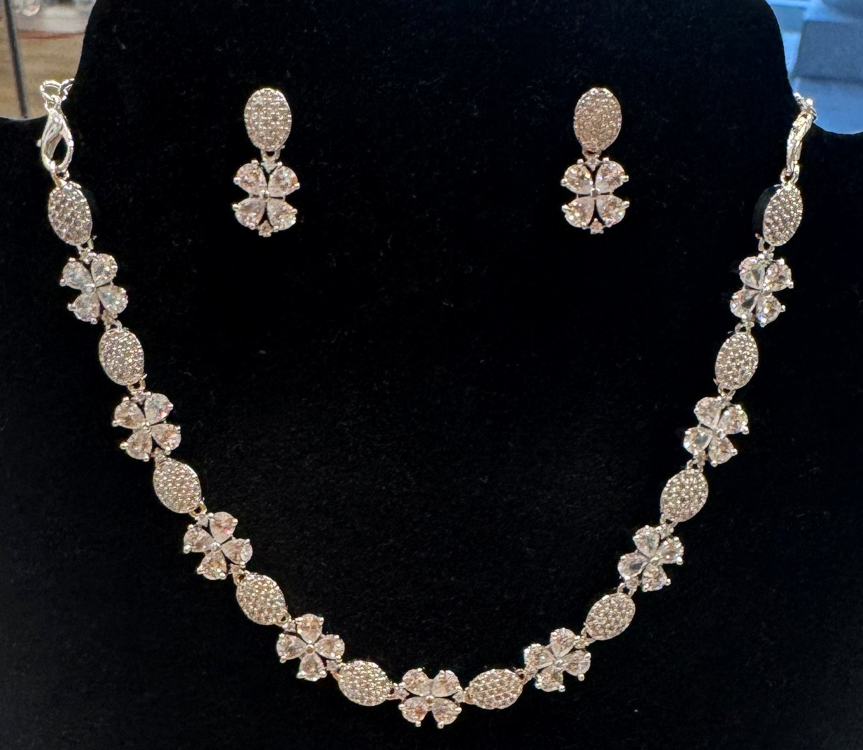 Pretty American Diamond Silver Stones Embedded Necklace and Earrings Set For Women