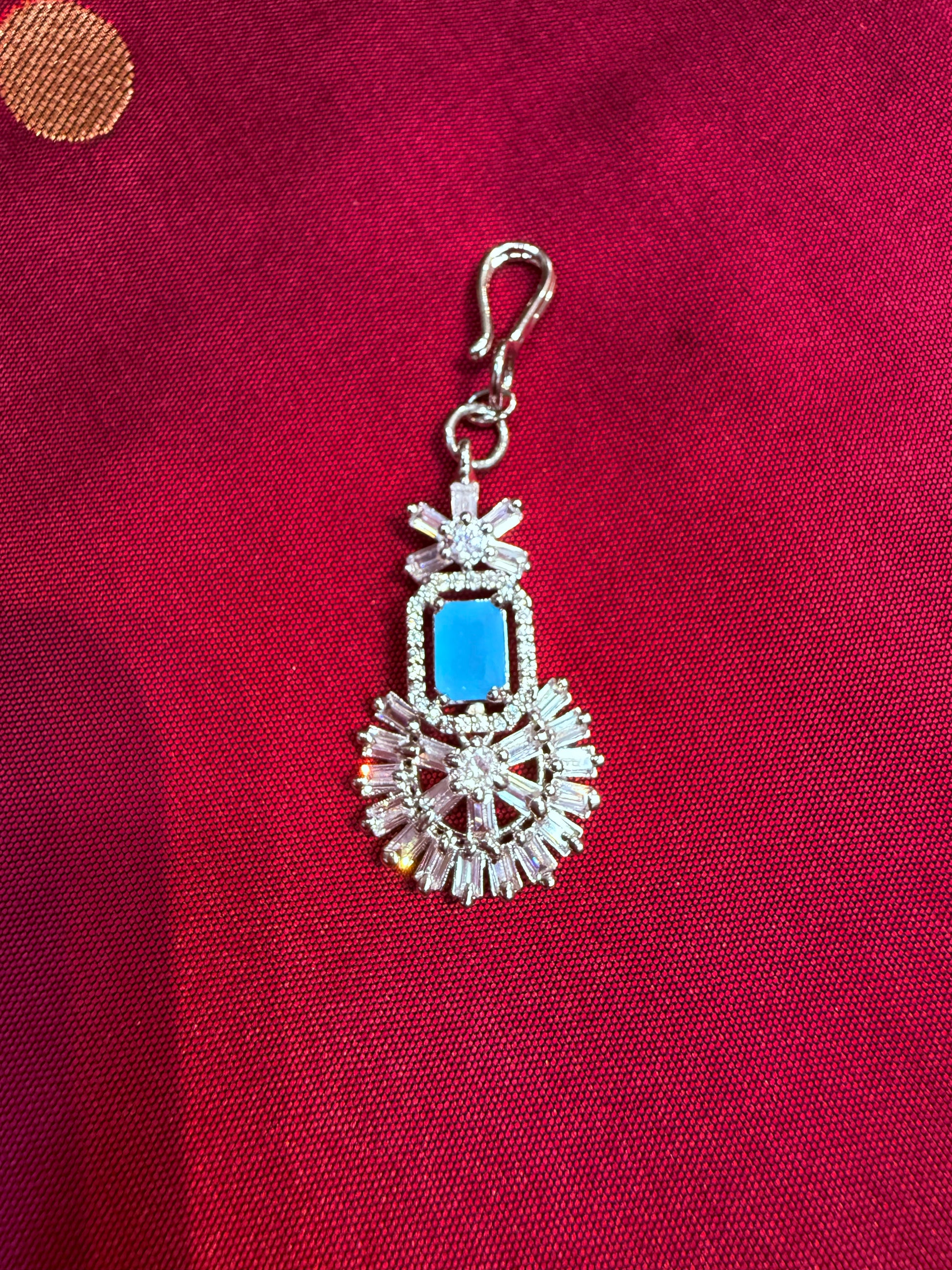 Attractive Designer Sky Blue Color AD Stone Maang Tikka Near Me