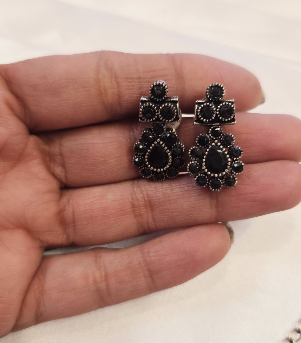 Alluring Floral Designed Silver Plated Black Color Oxidized Necklace Set With Earrings