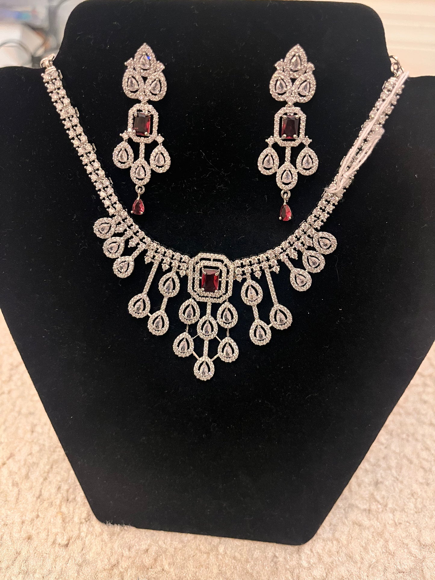 Alluring Pink Stoned American Diamonds Necklace with Earrings