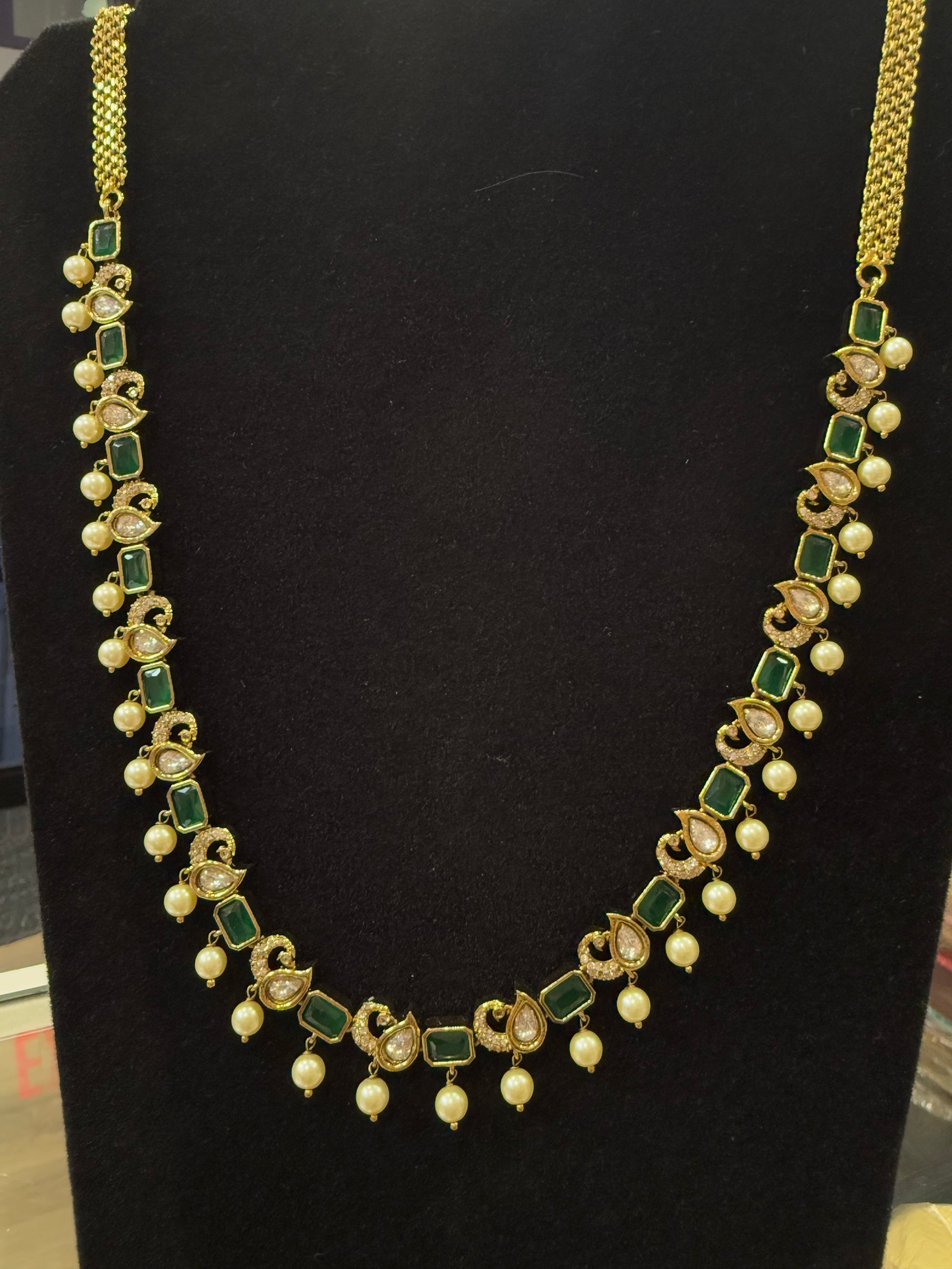Alluring Gold Plated Green Stoned And White Beaded Long Chain