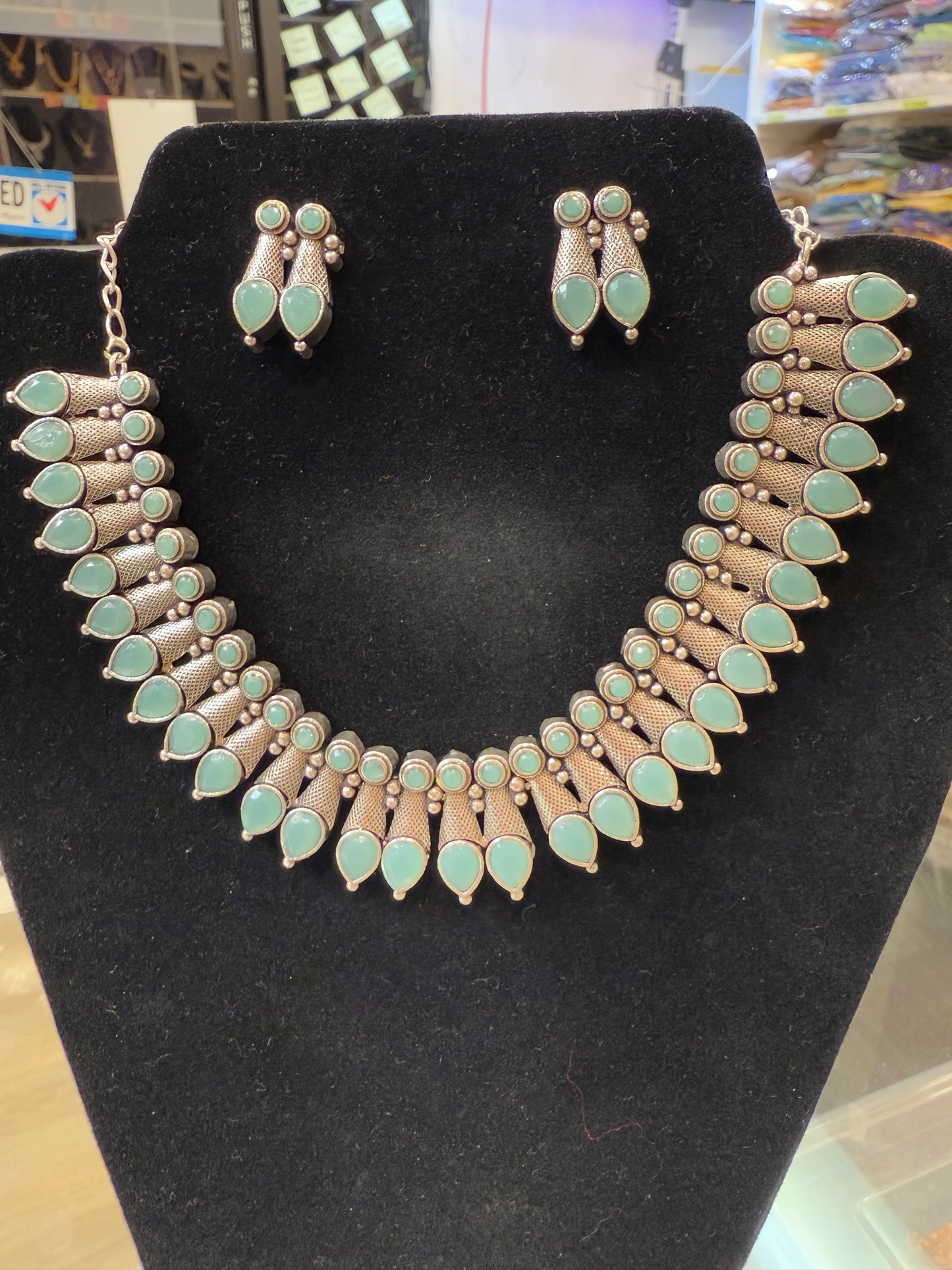 Alluring Sky Blue Color Stone Studded Design Oxidized Necklace With Earrings Set