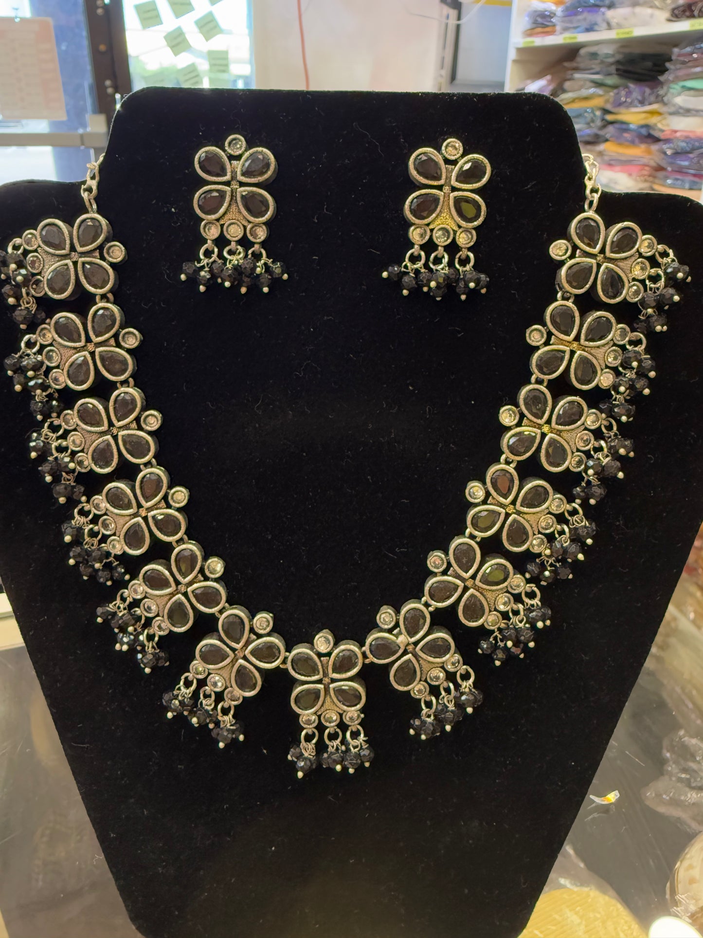 Alluring Black Stone Flower Design Silver Toned Oxidized Necklace Set With Earrings Near Me