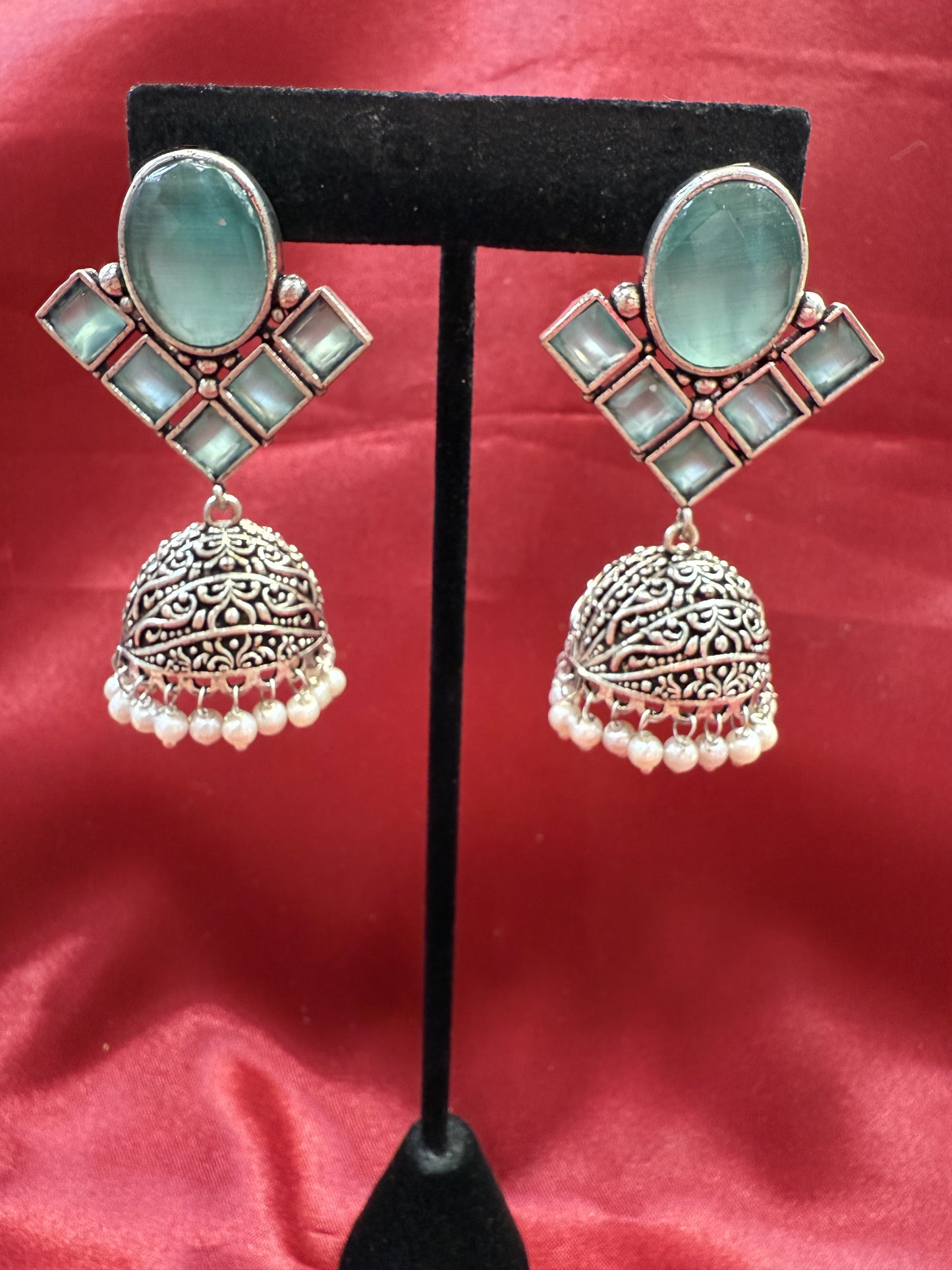 Alluring Light Green Stone Jhumka Design With Oxidized Earrings For Women