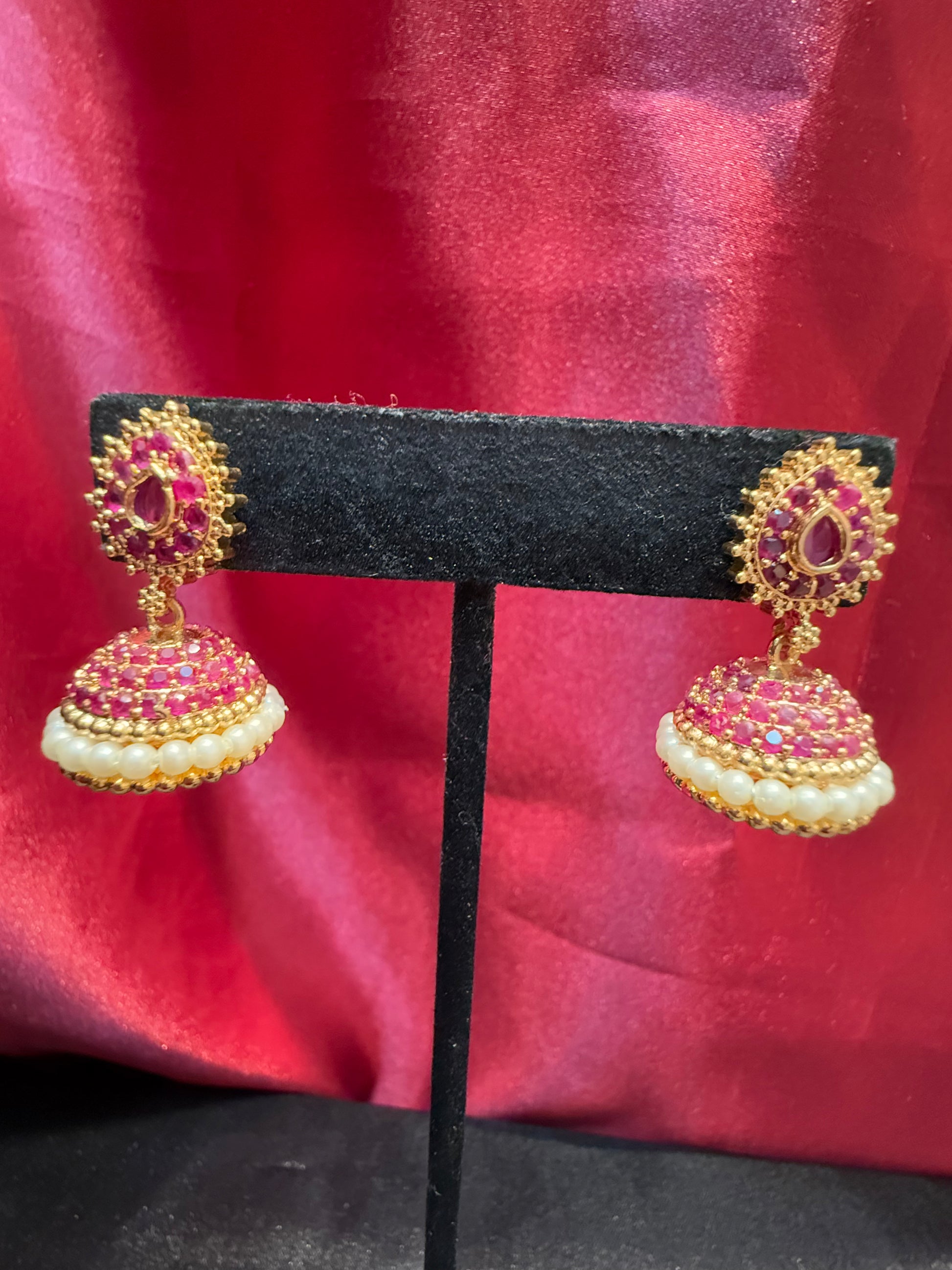 Appealing Gold Plated Design Jhumka With Hot Pink Color Stone With Pearl Drop