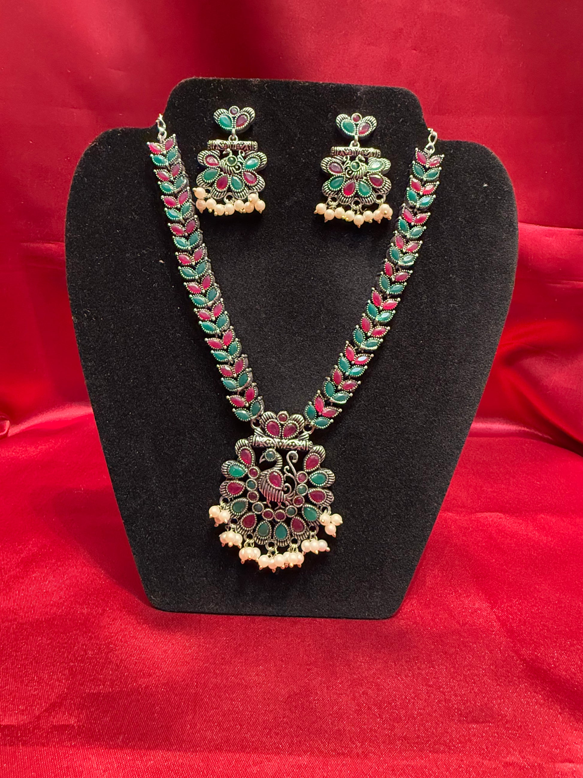 Mesmerizing Green And Maroon Color Peacock Design Oxidized Jewelry Necklace With Earrings