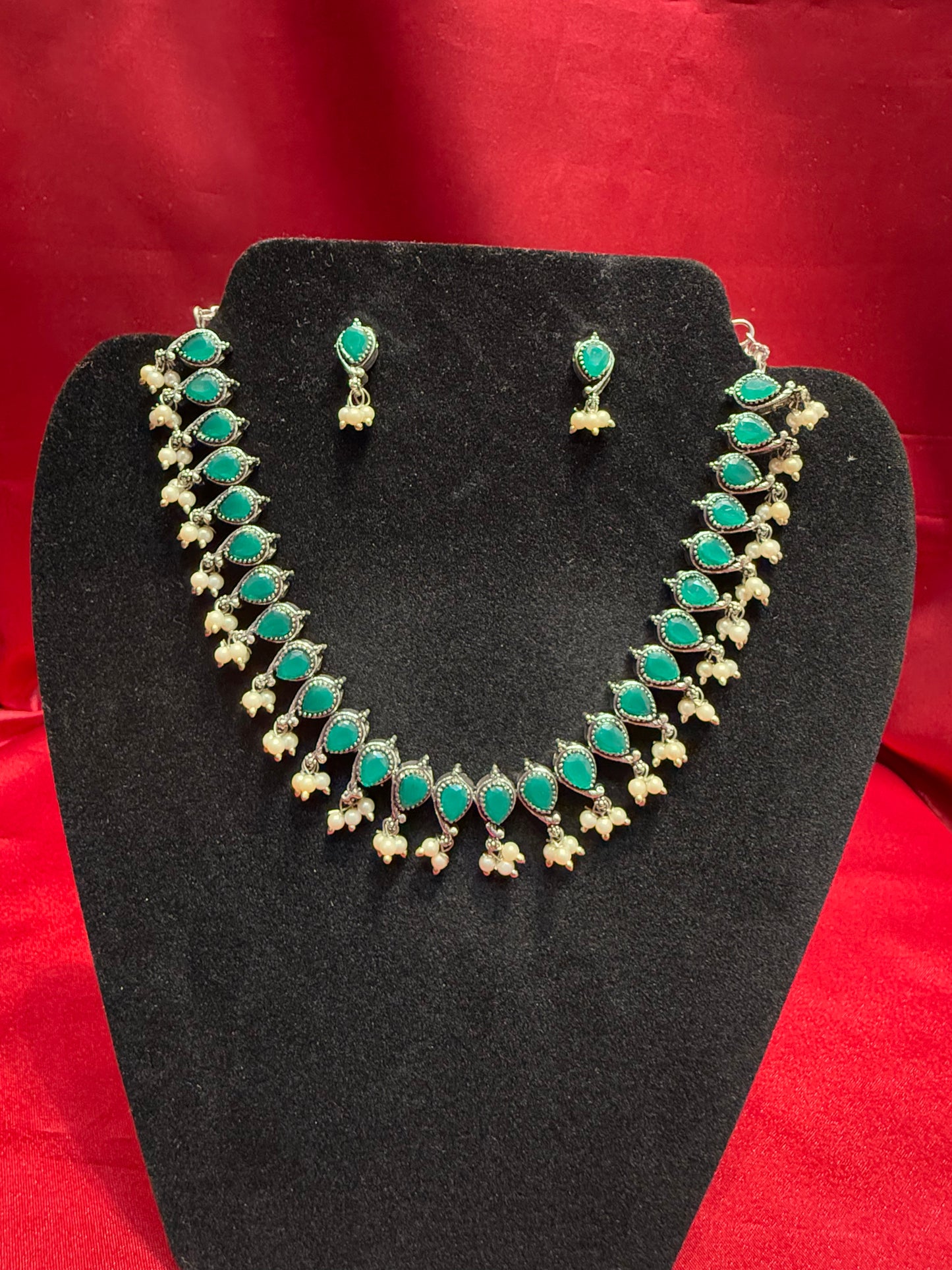 Appealing Emerald Green Stone Oxidized Pearl Beaded Necklace With Earrings Set