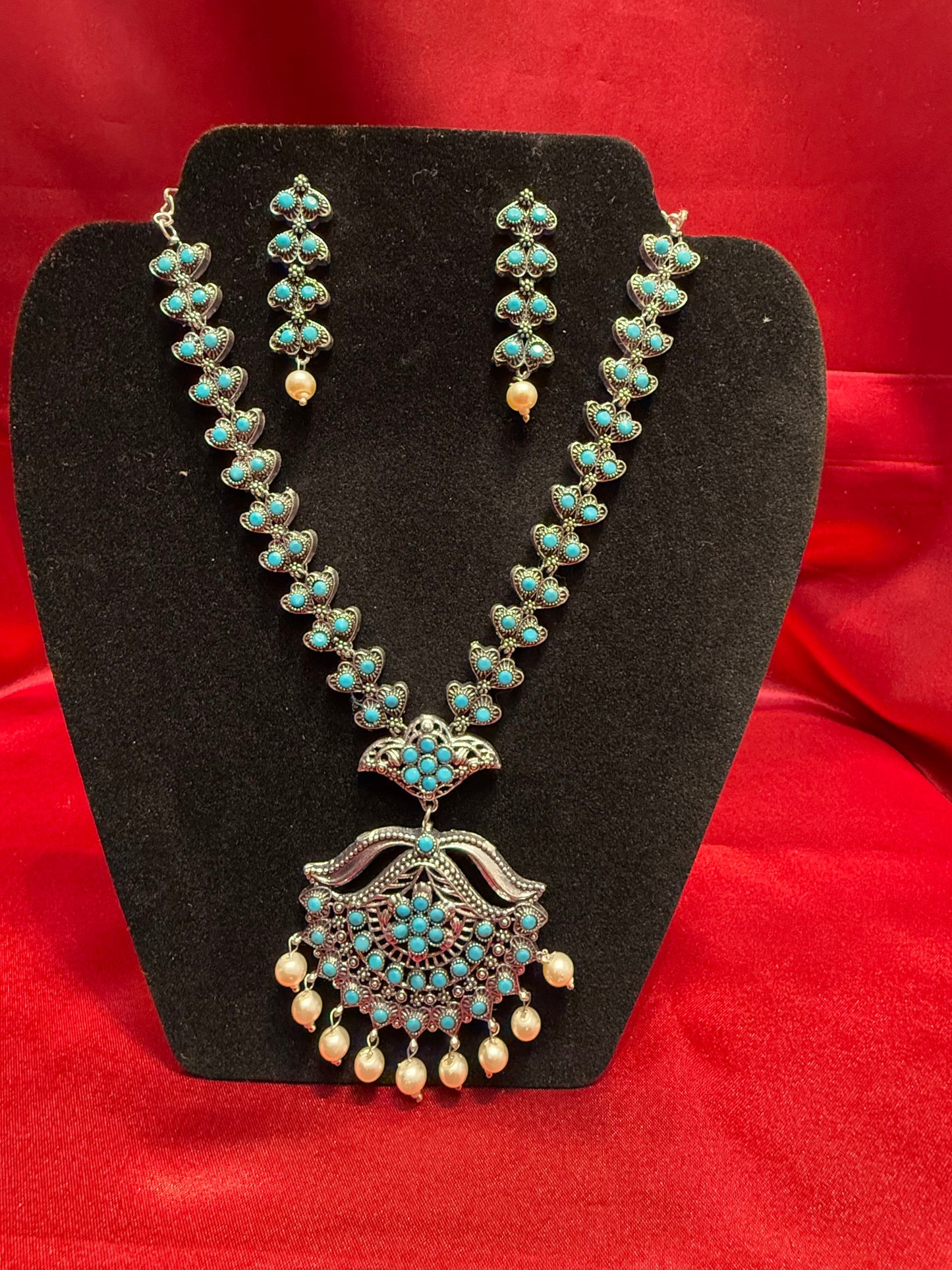 Alluring Sky Blue Color Oxidized Pearl Beaded Necklace With Earrings Set