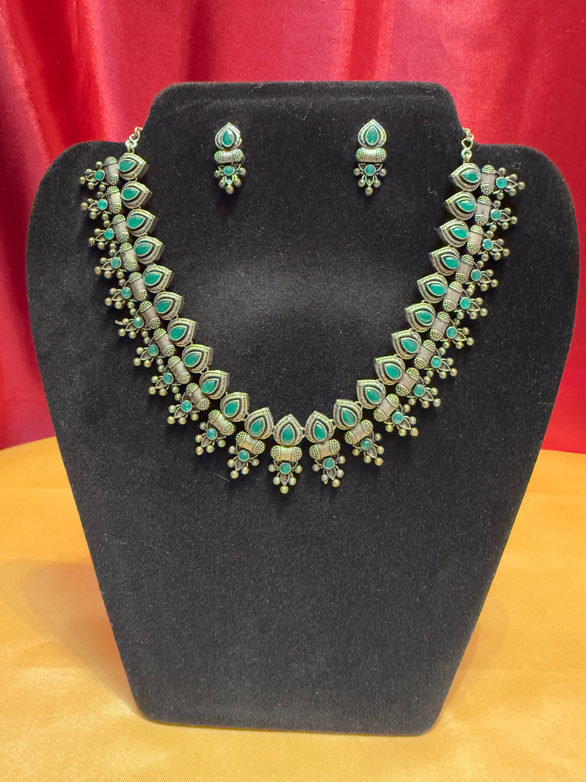 Fascinating Green Stoned Oxidized Necklace With Earring Set