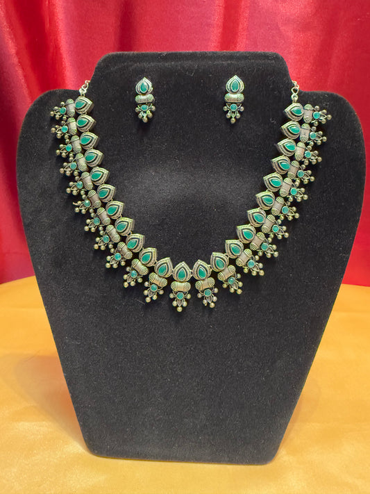 Fascinating Green Stoned Oxidized Necklace With Earring Set
