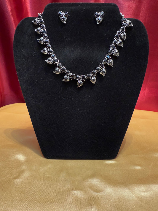 Graceful Black Color Stone Leaf Design Oxidized Necklace With Earring Set