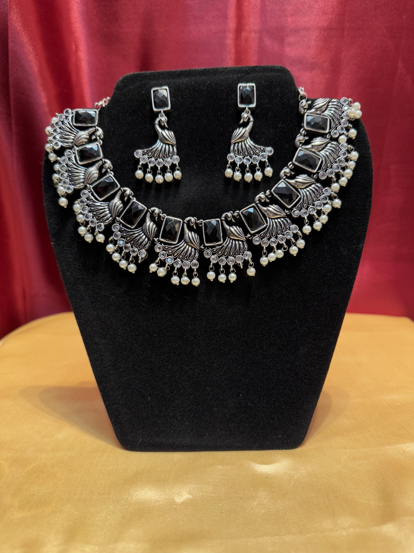 Black Color Peacock Designed Necklace With Earring Set In Yuma