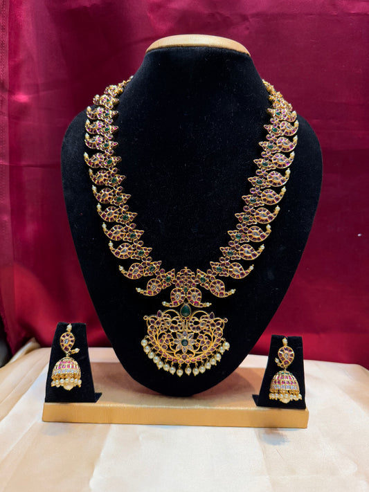 Alluring Long Gold Mango Motif Design Necklace Set With Multicolor Stones