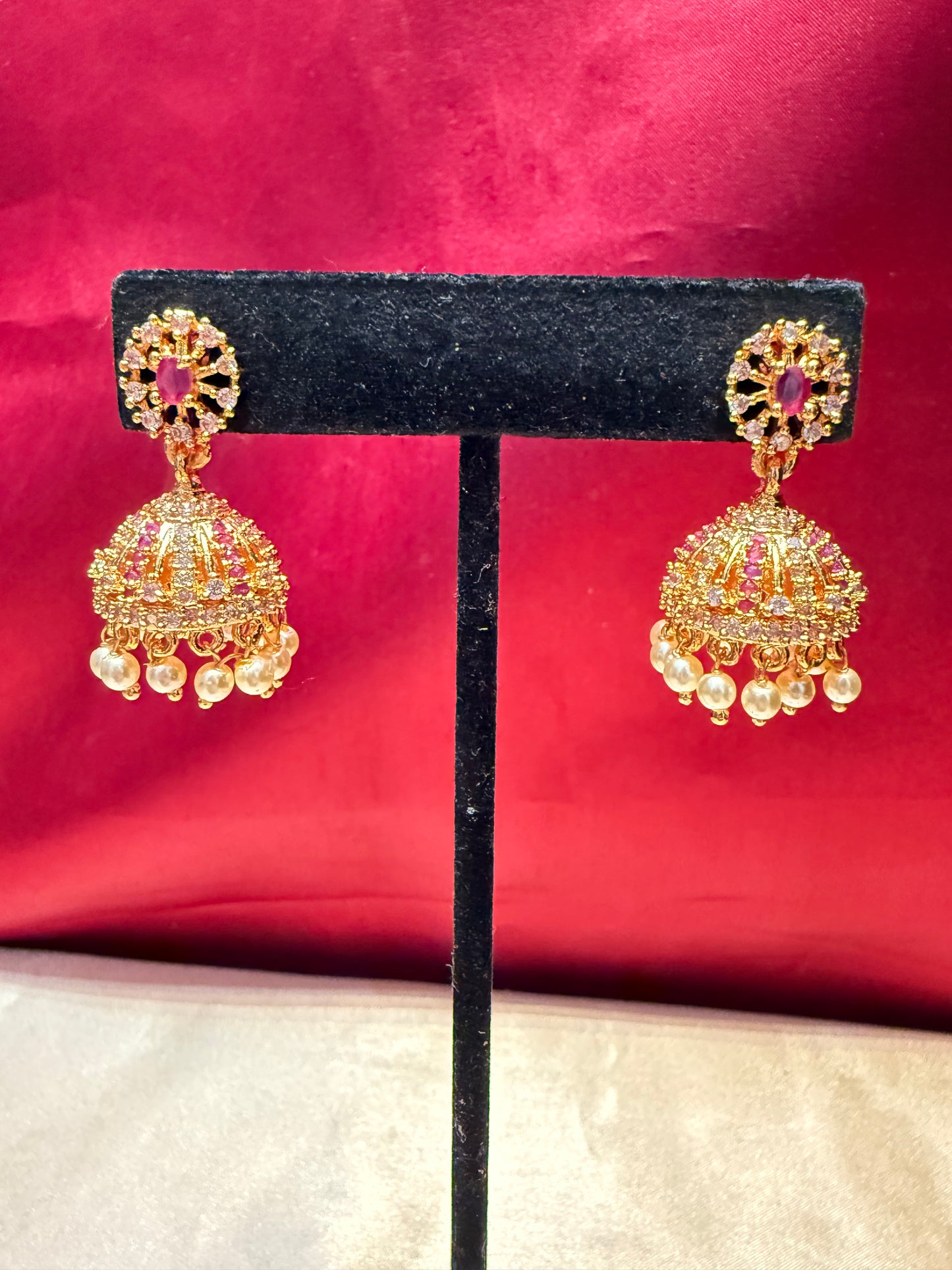 Stunning Pink And White Stone Gold Plated Jhumka With Pearls Beaded Design For Women