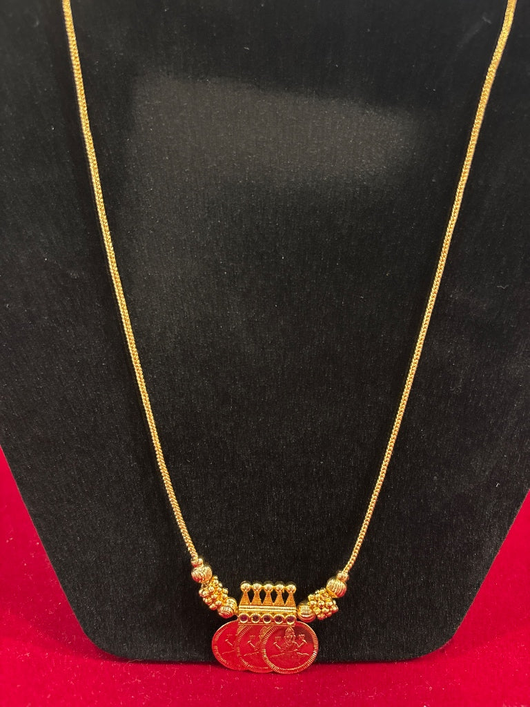 Amazing Gold Chain Necklace with Lakshmi Coin Pendant And Red Stone Accents