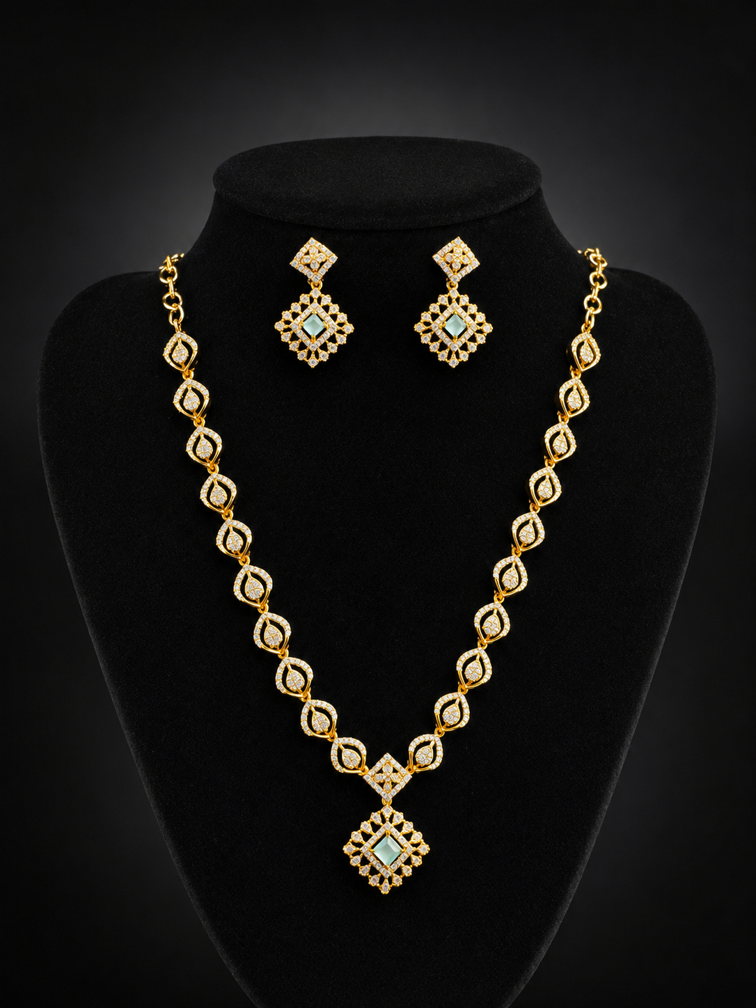 Attractive Gold-Plated American Diamond Mint Green Stone Necklace Set with Diamond-Shaped Locket & Earrings