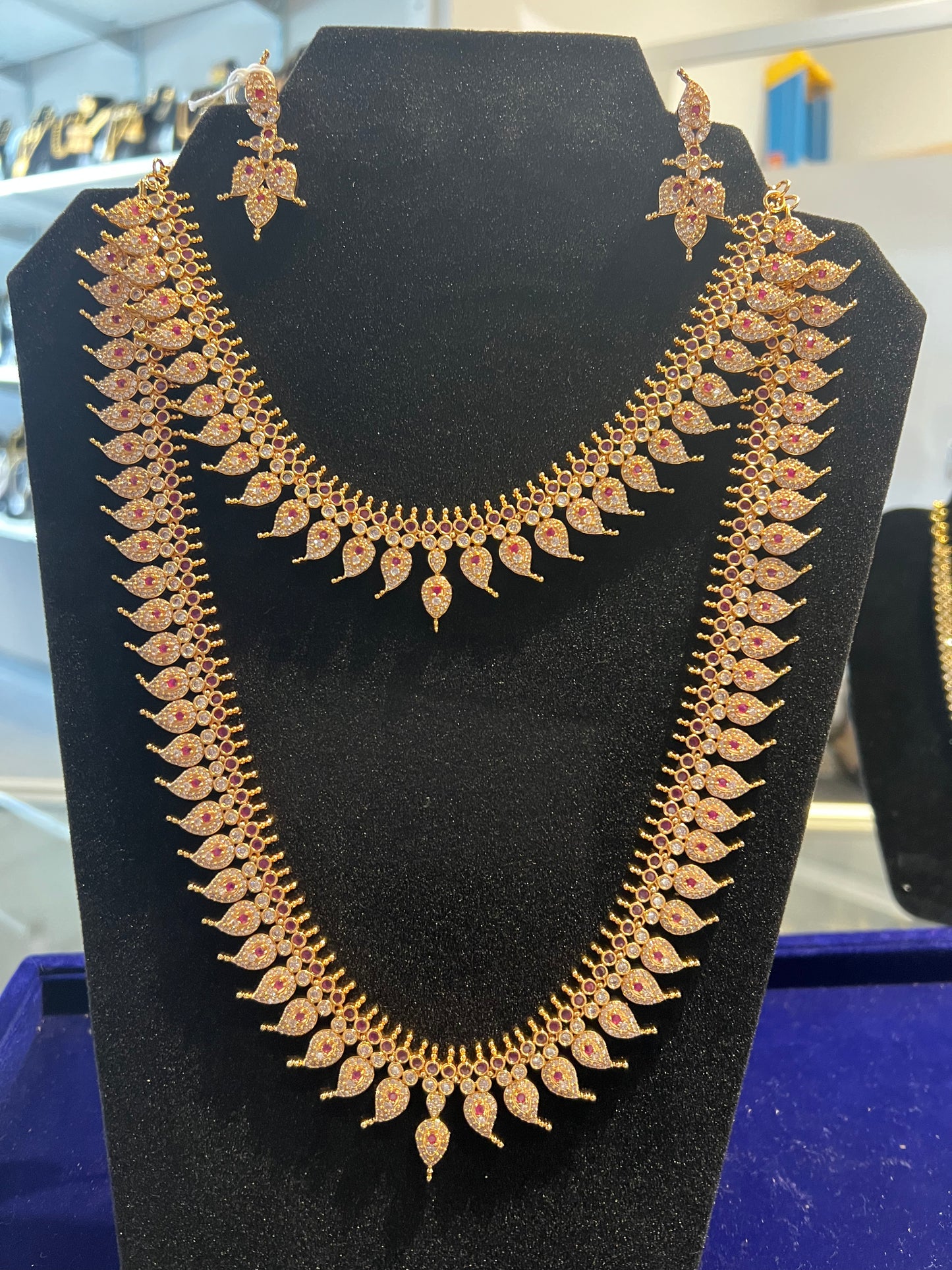 Gorgeous White And Ruby Red Gold Plated Necklace and Long Haram Set With Earrings For Women
