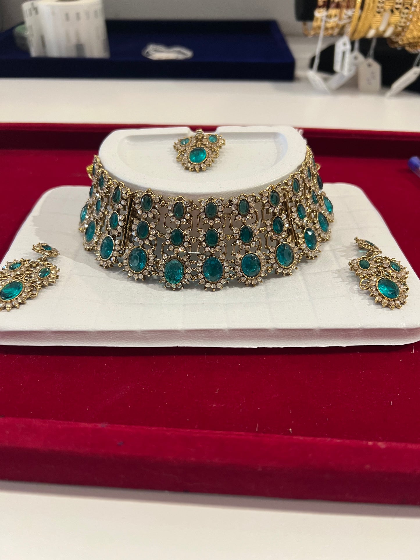 Attractive Light Green And Gold Stones Antique Gold Choker With Maang Tikka And Earrings For Women