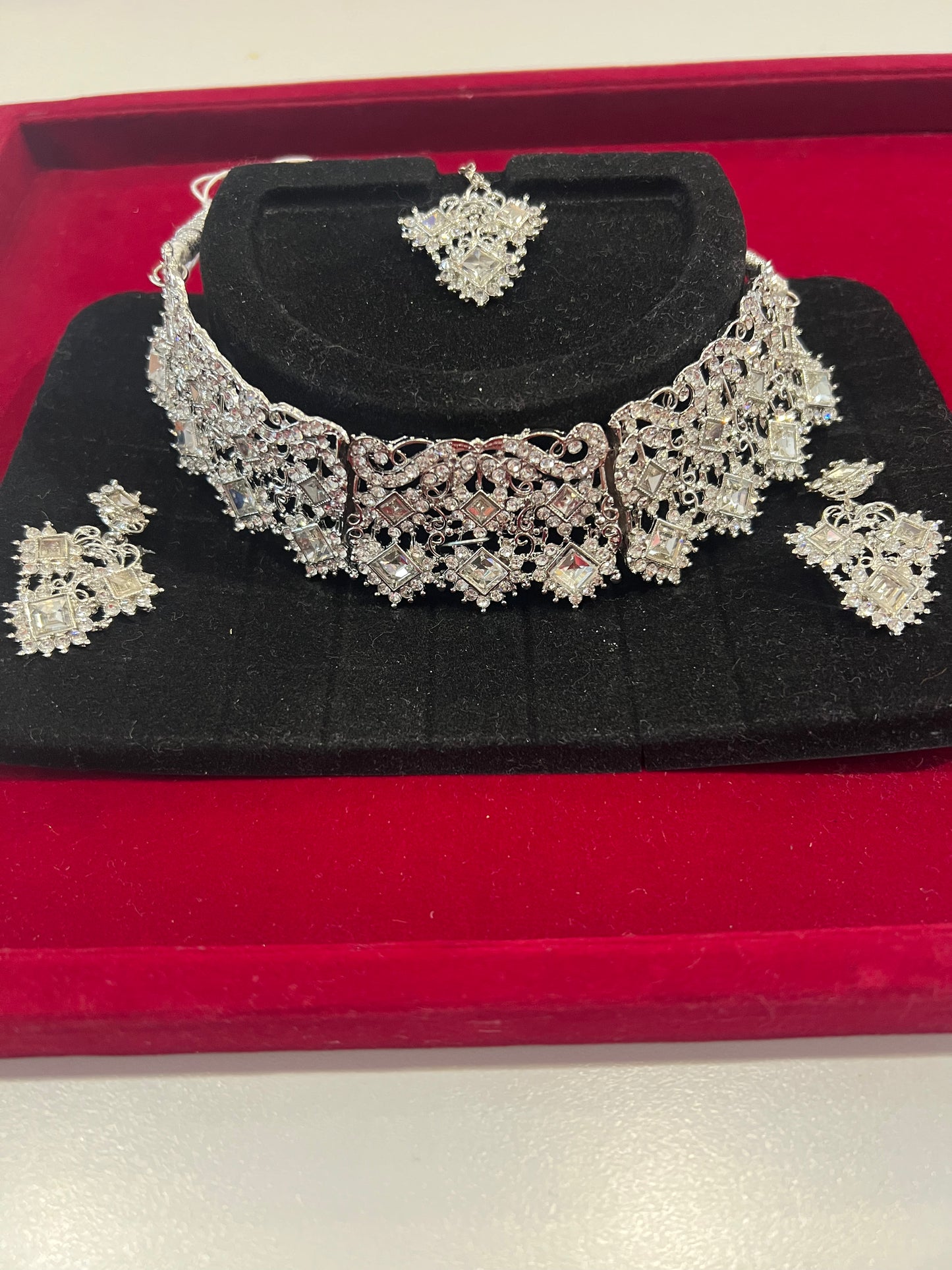 Stunning White And Silver Color Choker along With Maang Tikka And Earrings For Women