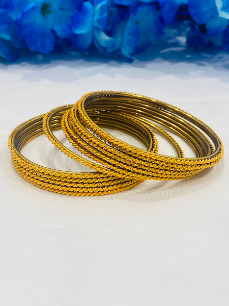 Fascinating Yellow Color Antique Gold Bangles With Plain Running Dots