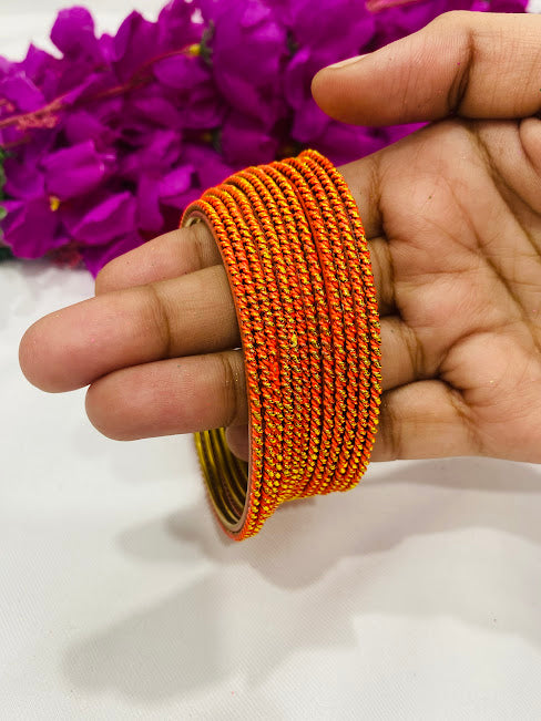 Alluring Orange Color Antique Gold Designer Bangle Sets With Plain Running Dots