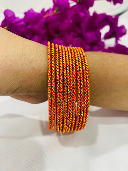 Alluring Orange Color Antique Gold Designer Bangle Sets With Plain Running Dots