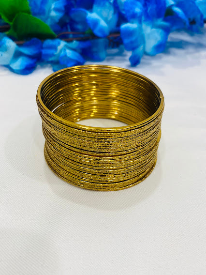 Alluring Glittery Gold Plated Designer Party Style Thin Metal Bangle in USA