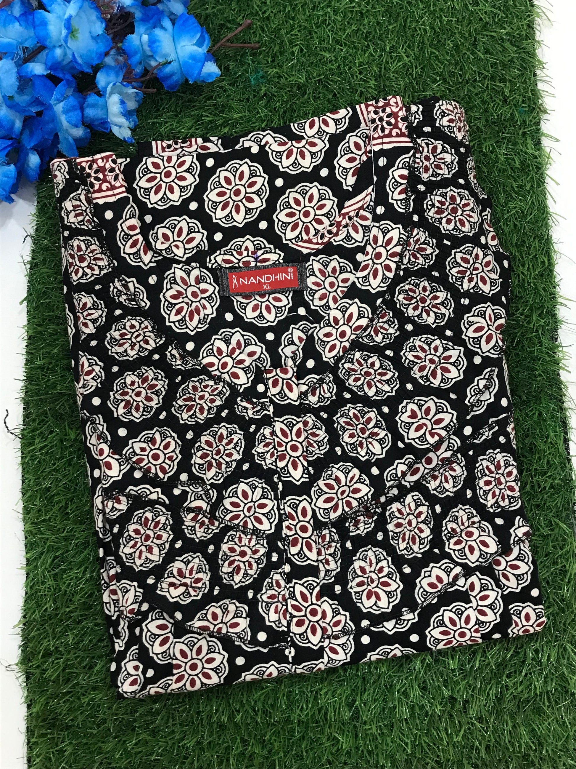 Restful Black Color Nighty With White Flower Design