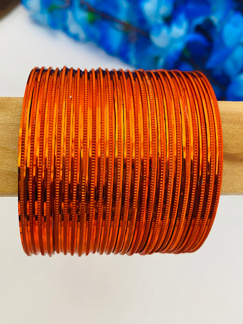 Alluring Orange Color Fancy Metal Bangle Sets