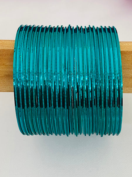 Alluring Plain Metal Bangle With Rama Green Color