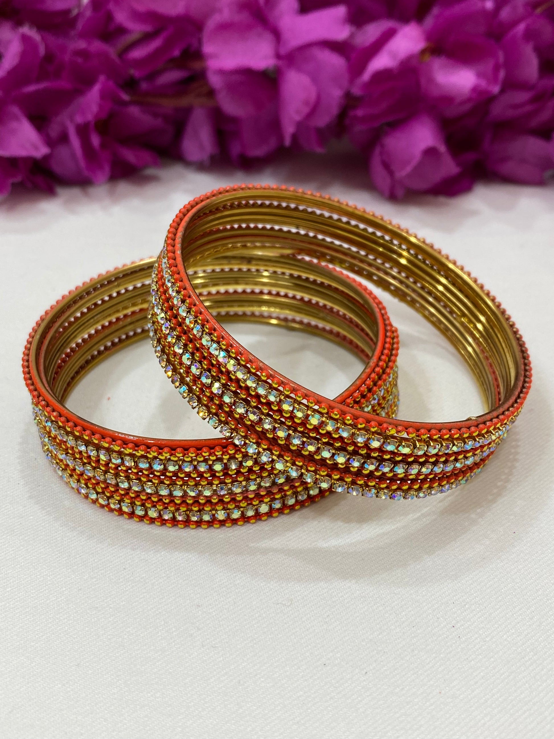 Alluring Orange Color Bangles With Flashing White Stone In Tempe