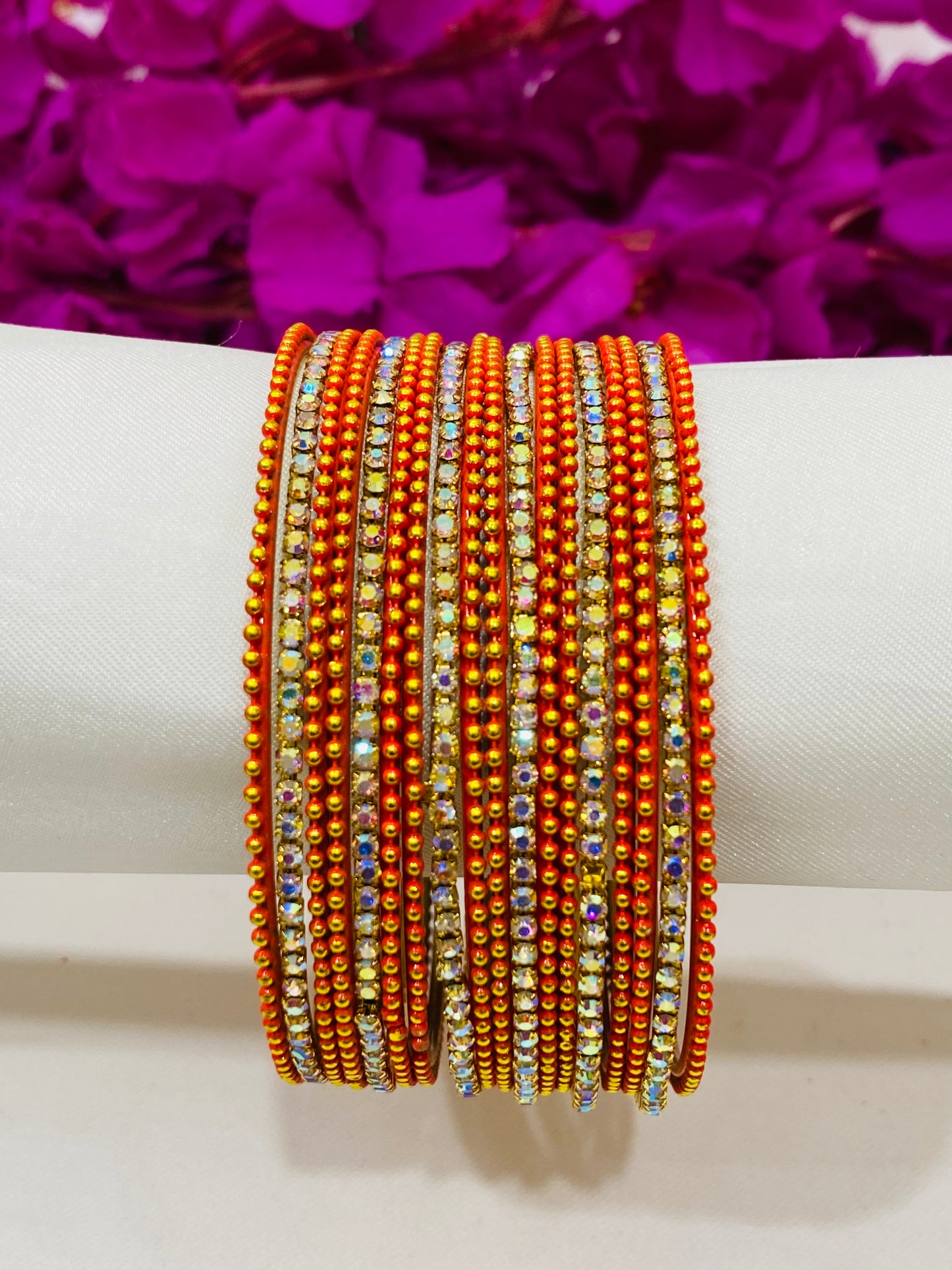 Alluring Orange Color Bangles With Flashing White Stone Near Me