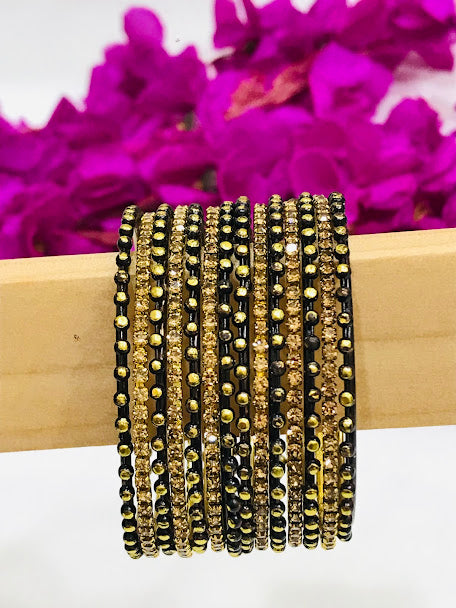Black Color Designed Metal Bangles In Cotton wood