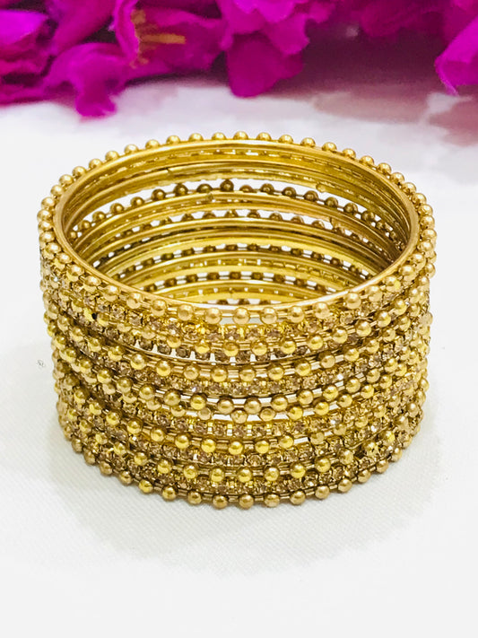Beautiful Gold Color Dot Designed Metal Bangles Set For Girls