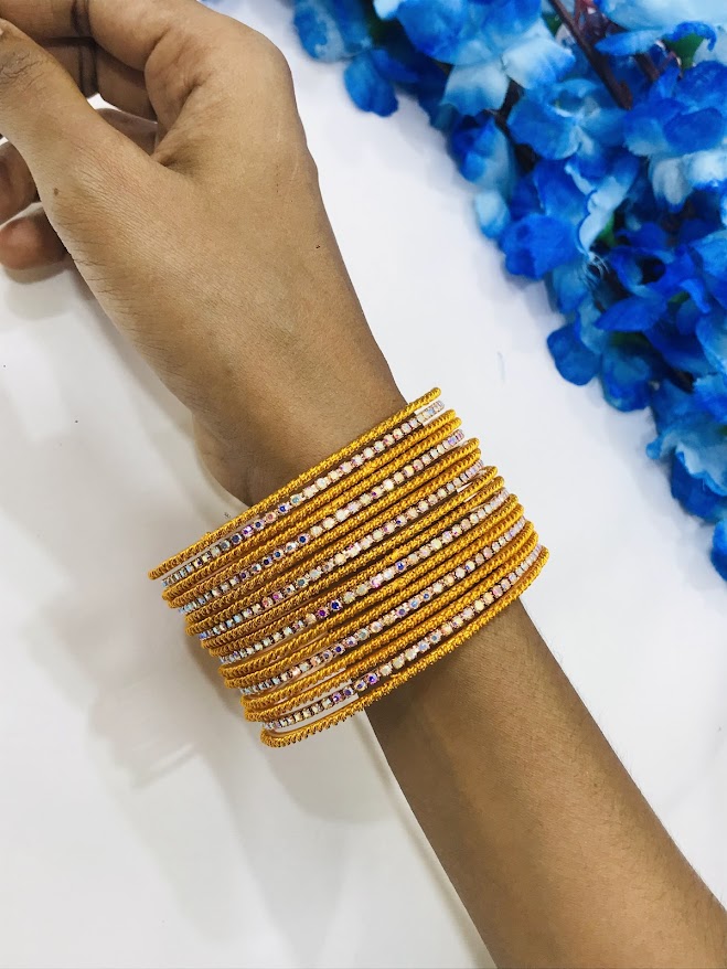 Yellow Colored Designer Metal Bangles With White Stones In Williams