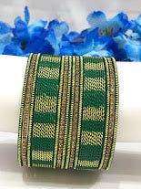 Mesmerising Dark Green Colored Metal Bangles With Spiral Design Near Me